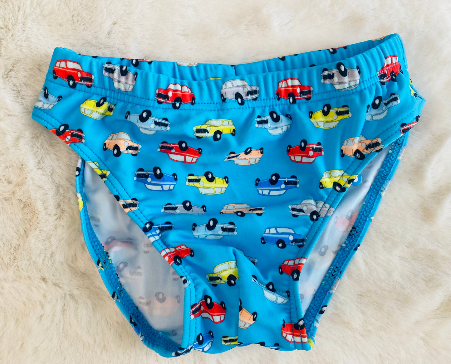 Slip mare bambino celeste con stampa macchinine colorate
