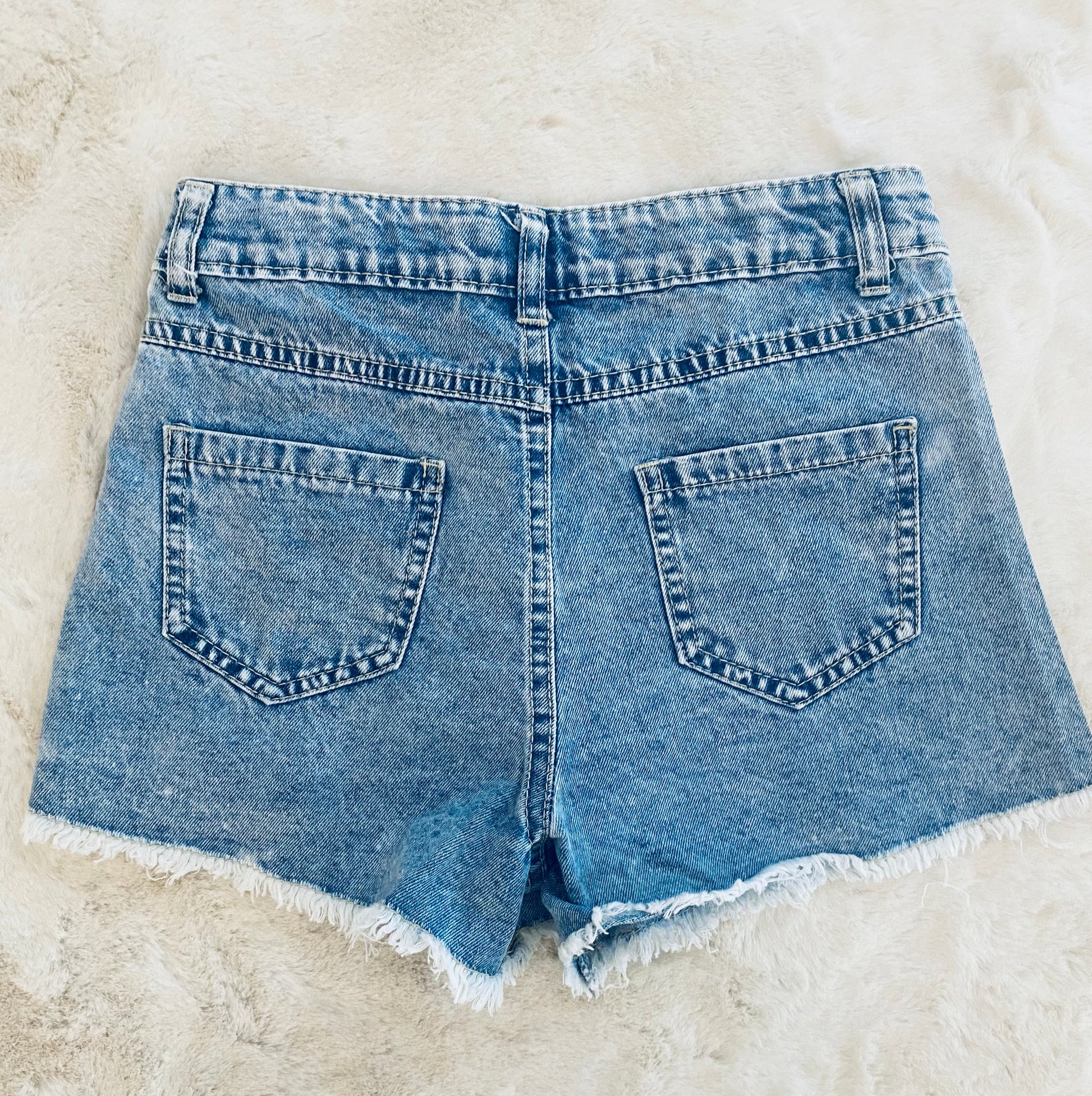 Pantaloncino Jeans Bambina con Strass, Strappi e Orlo a Taglio Vivo - SMILE BABY BOTIQUE