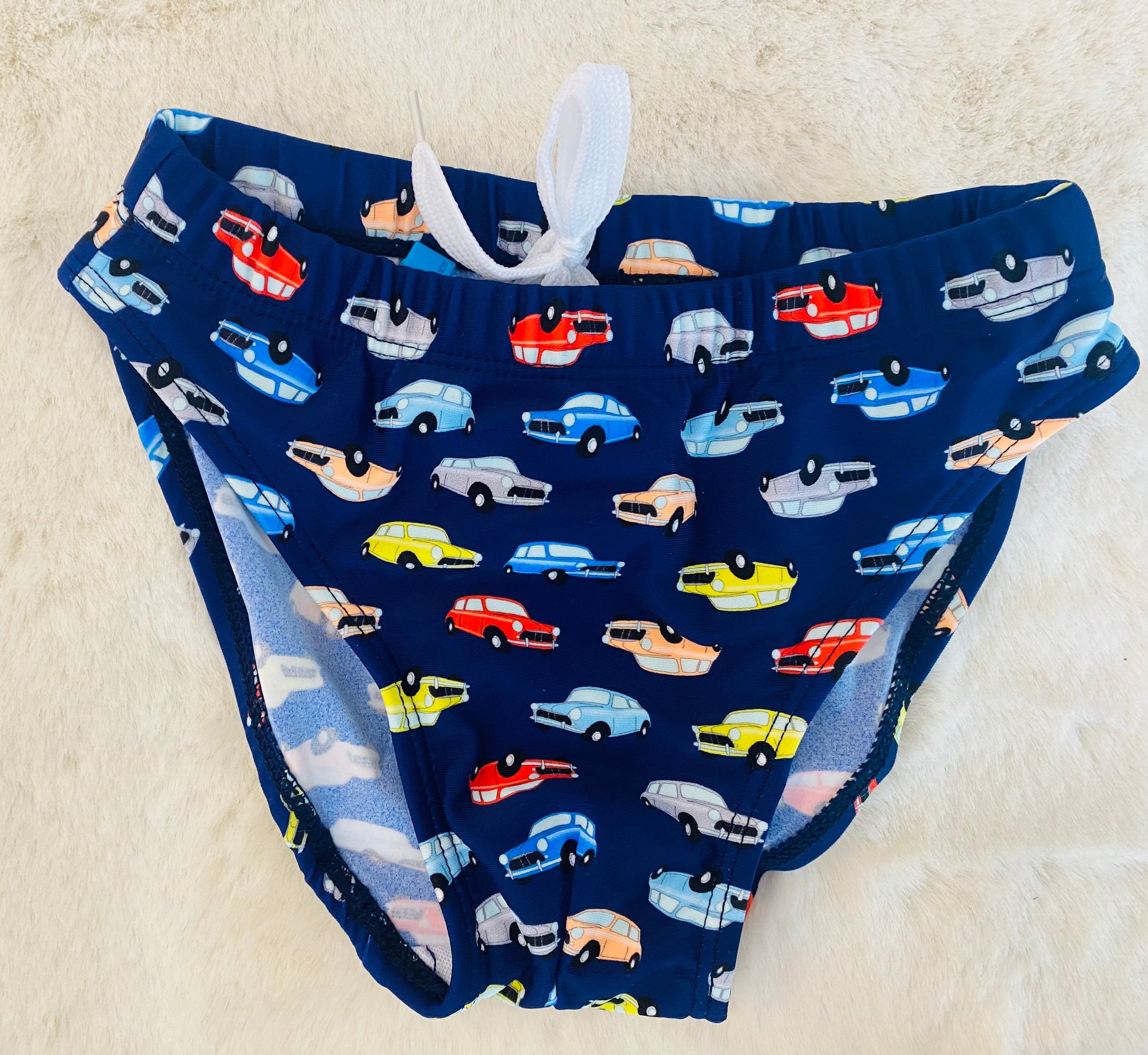 Slip mare bambino blu con stampa macchinine colorate