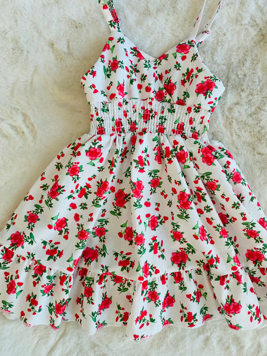 Vestito estivo bambina con stampa floreale rossa, spalline sottili e balze.
